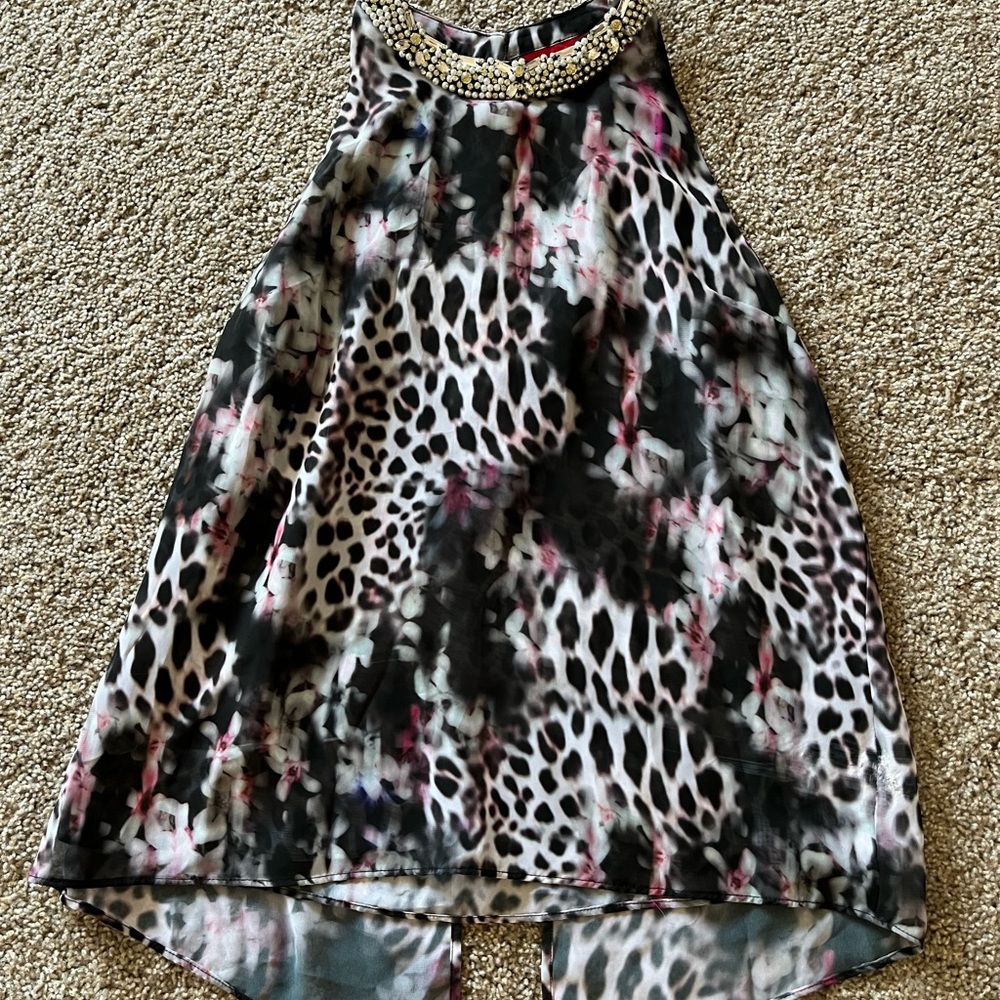 Jennifer Lopez sleeveless blouse. Size medium.